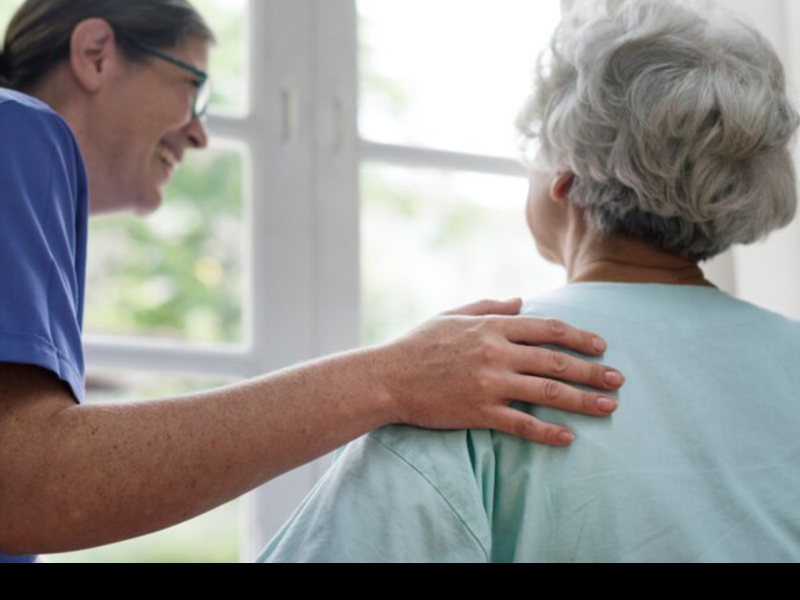 nurse taking care of woman